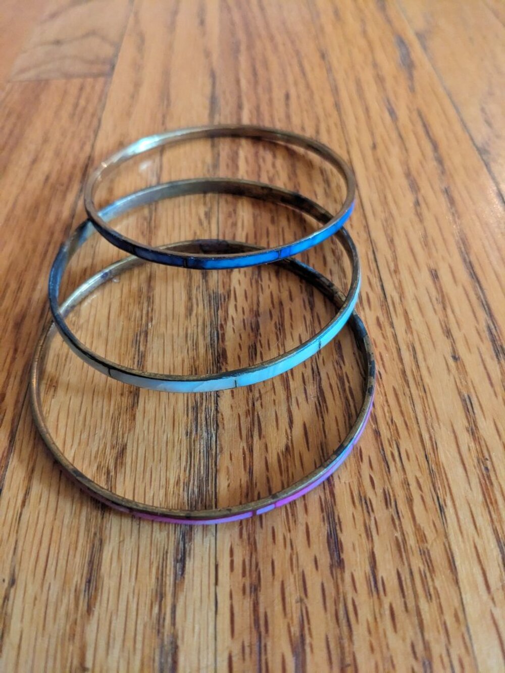Set of vintage bras and mother of the pearl bangles